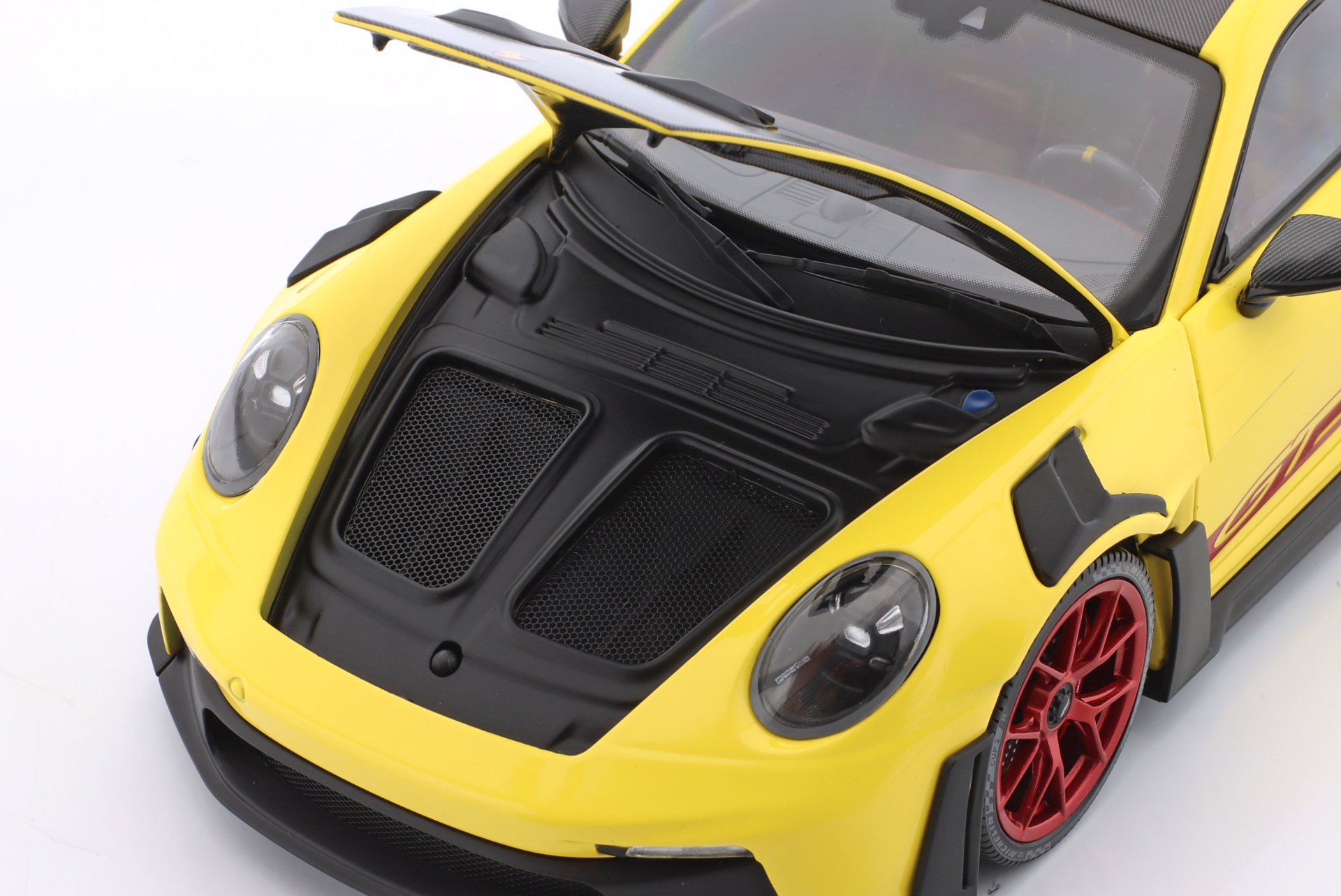 Porsche 911 (992) GT3 RS Weissach-Paket 2024 gelb / rote Felgen  