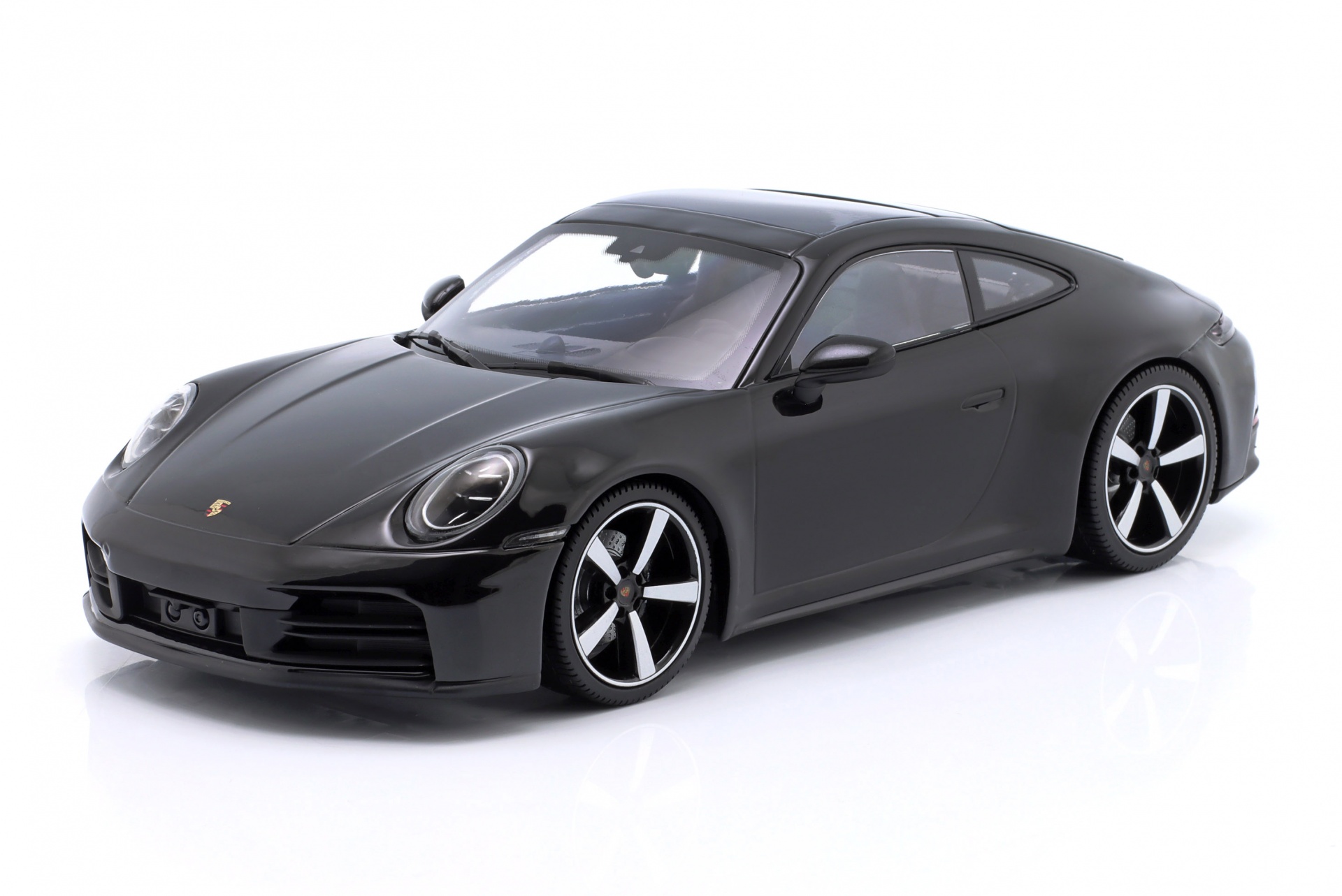 Porsche 911 (992.2) Carrera Coupe Baujahr 2024 schwarz metallic  