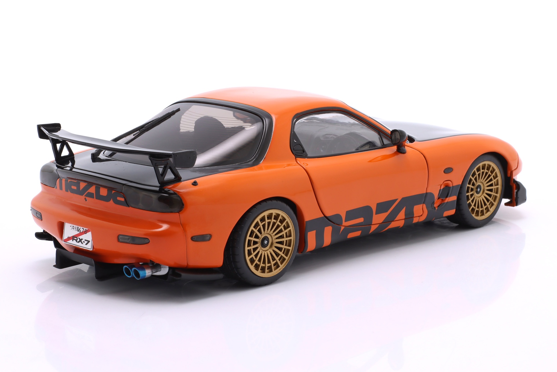 Mazda RX-7 Typ RS (FD3S) Baujahr 1999 orange / schwarz  