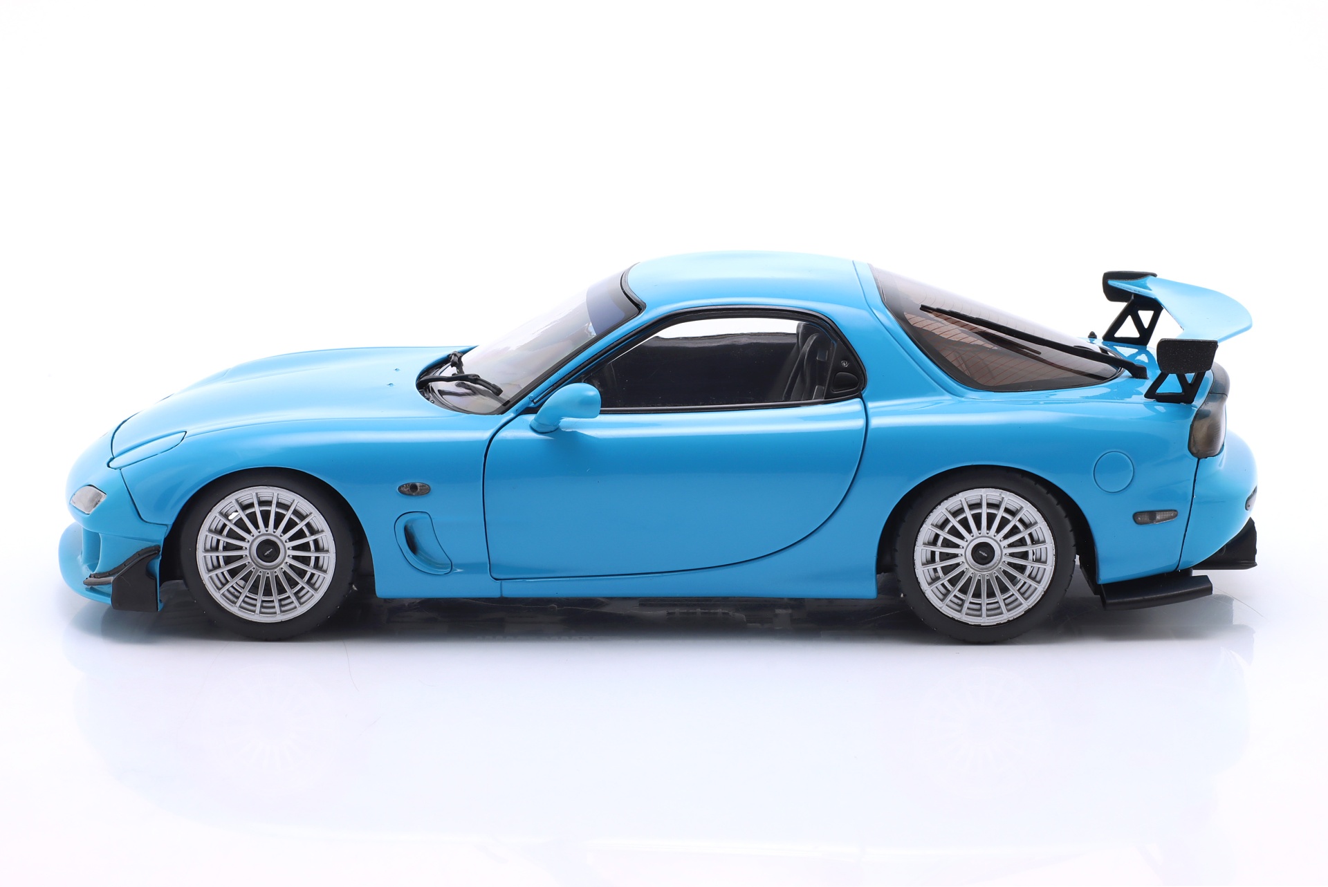 Mazda RX-7 Typ RS (FD3S) Baujahr 1999 neonblau  