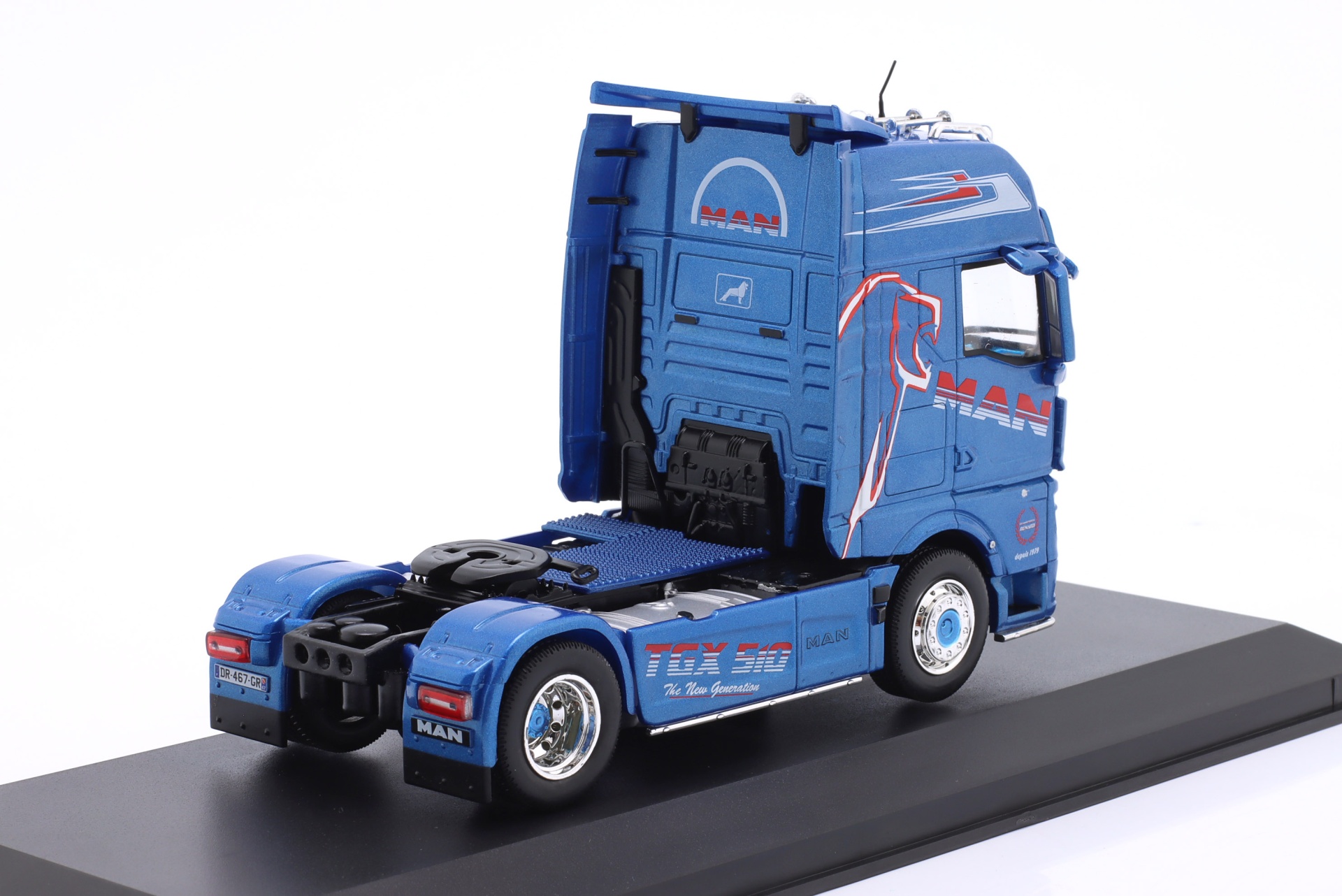 MAN TGX XXL  Sattelzugmaschine Baujahr 2021 blau metallic / Dekor  